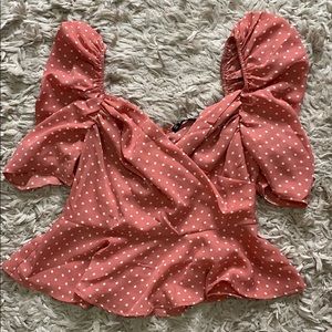 Pink polka dot peplum top